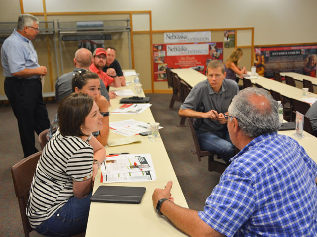 At a University of Nebraska-Lincoln (UNL) Extension meeting about farm stress, attendees break into small group discussion about how stress affects them individually. The meeting was held July 19 at the UNL&#039;s Eastern Nebraska Research and Extension Center near Ithaca, Nebraska. (DTN photo by Russ Quinn)